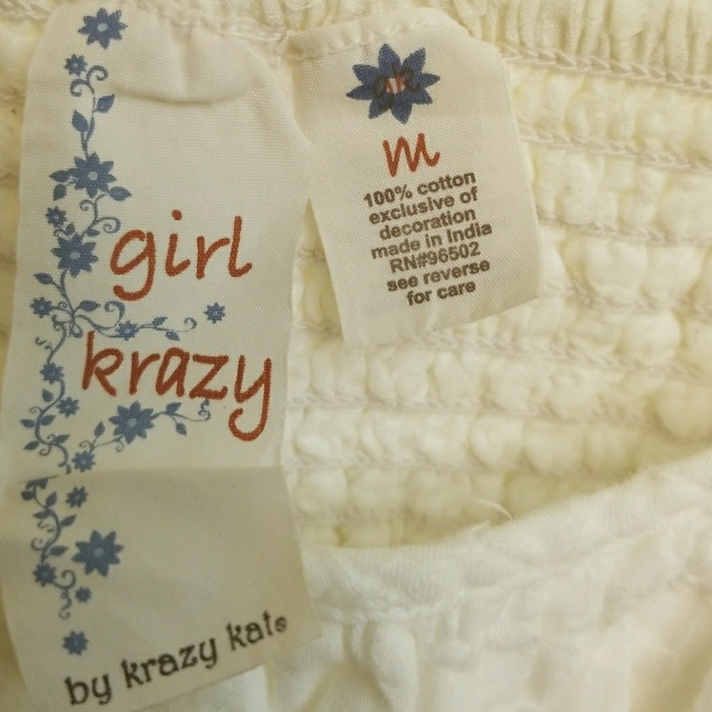 Trendy white, cotton sleeveless top